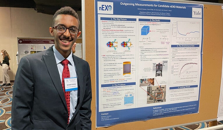 Zemenu presenting his research at the American Physical Society division of nuclear physics meeting in New Orleans in 2022