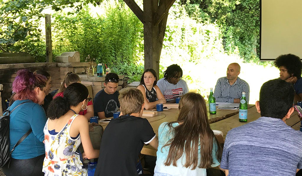 Yale professor Ziad Ganim with students from the  Pathways to Science Summer Scholars program at Yale Farm.