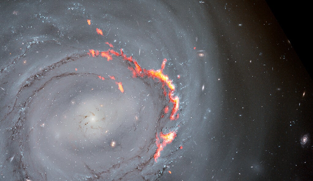 Zoomed in view of an ALMA (red/orange) and Hubble Space Telescope (optical) composite of NGC4921