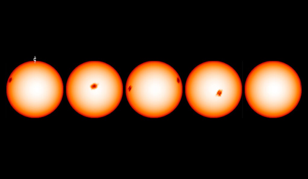Reconstructed surface of the spotted star Epsilon Eridani with each panel showing the star advanced one-fifth of its rotation.