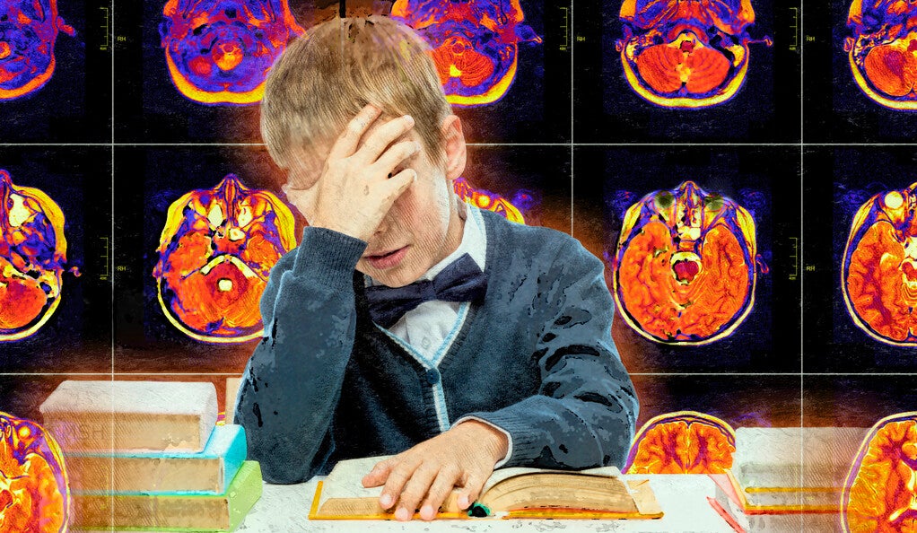 A frustrated boy with books in front of a backdrop of brain scans