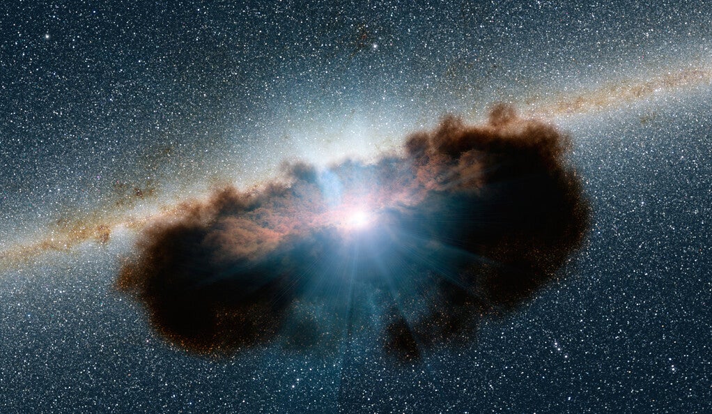 A black hole surrounded by gas and dust.