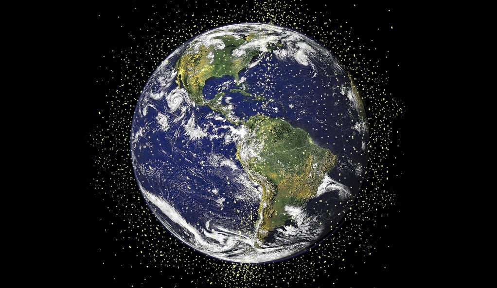 Illustration, planet Earth surrounded by orbiting space debris.