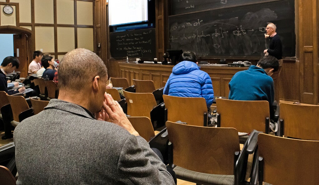 Professor Larry Gladney sitting in on an organic chemistry lecture by Scott Miller during Faculty Bulldog Days in 2023.