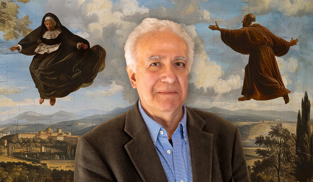 Carlos Eire in front of an old oil painting.