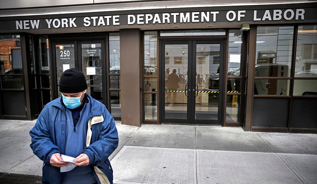 Visitors to the Department of Labor are turned away at the door by personnel due to closures over coronavirus concerns