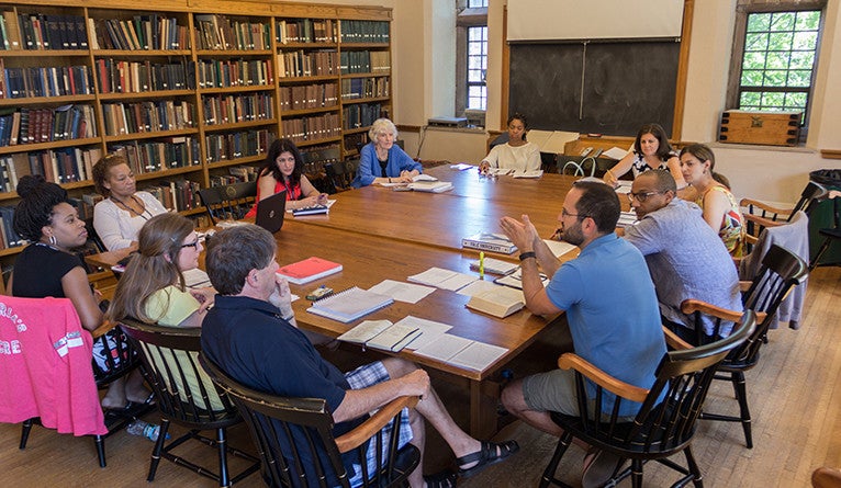 Janice Carlisle (in blue, at center) teaches a class in 2016. 