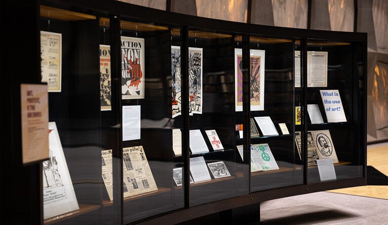 Side view of “Art and Protest in the Archive” display case