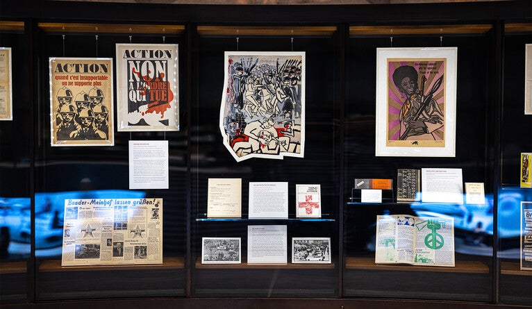 Display of materials that grapple with the interaction of art, protest, and violence.