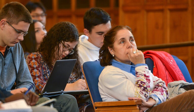 Professor Juliana Ramos-Ruano sits in on a class during Faculty Bulldog Days in 2015